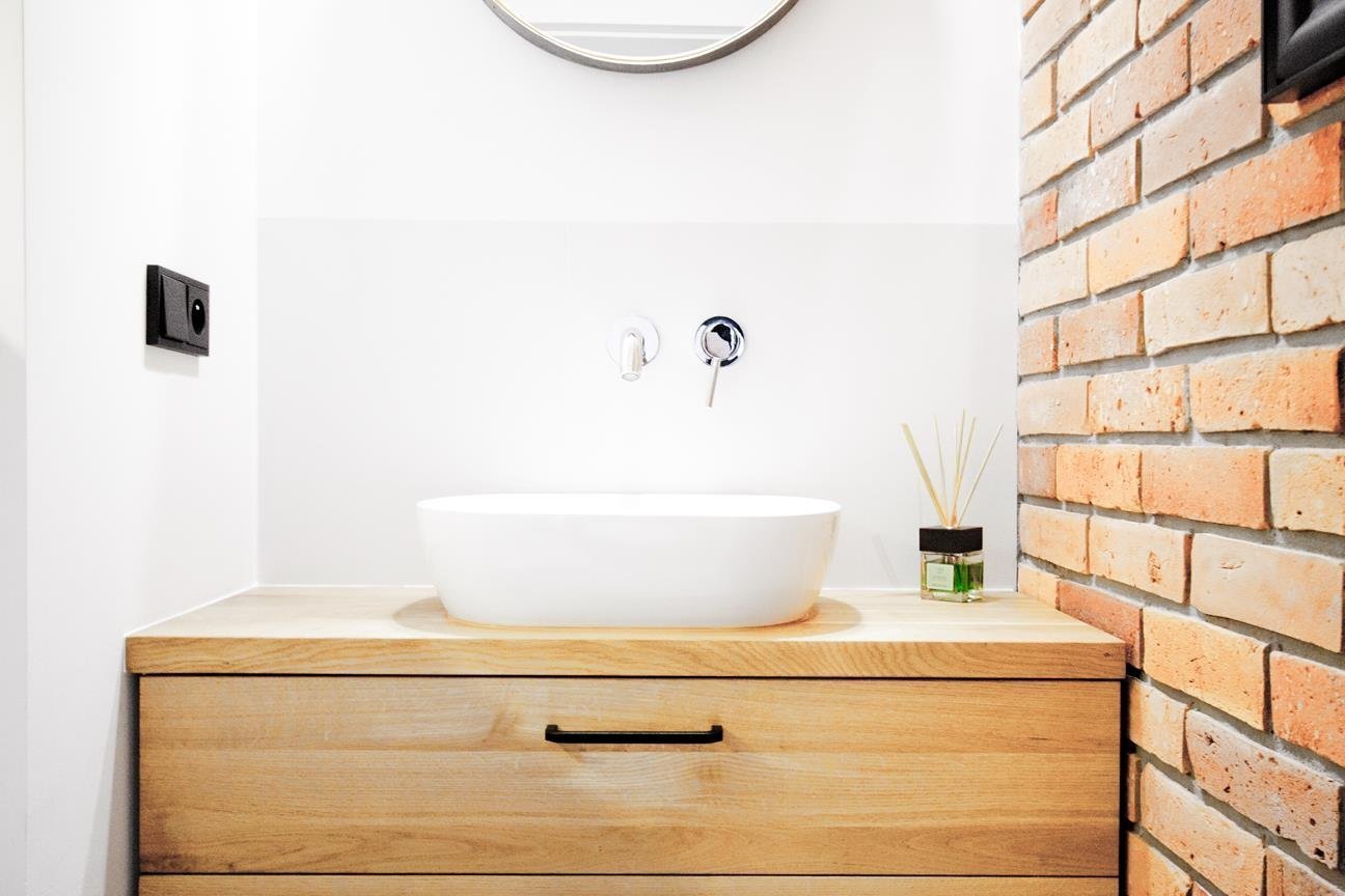 Byt s cihlovým obkladem