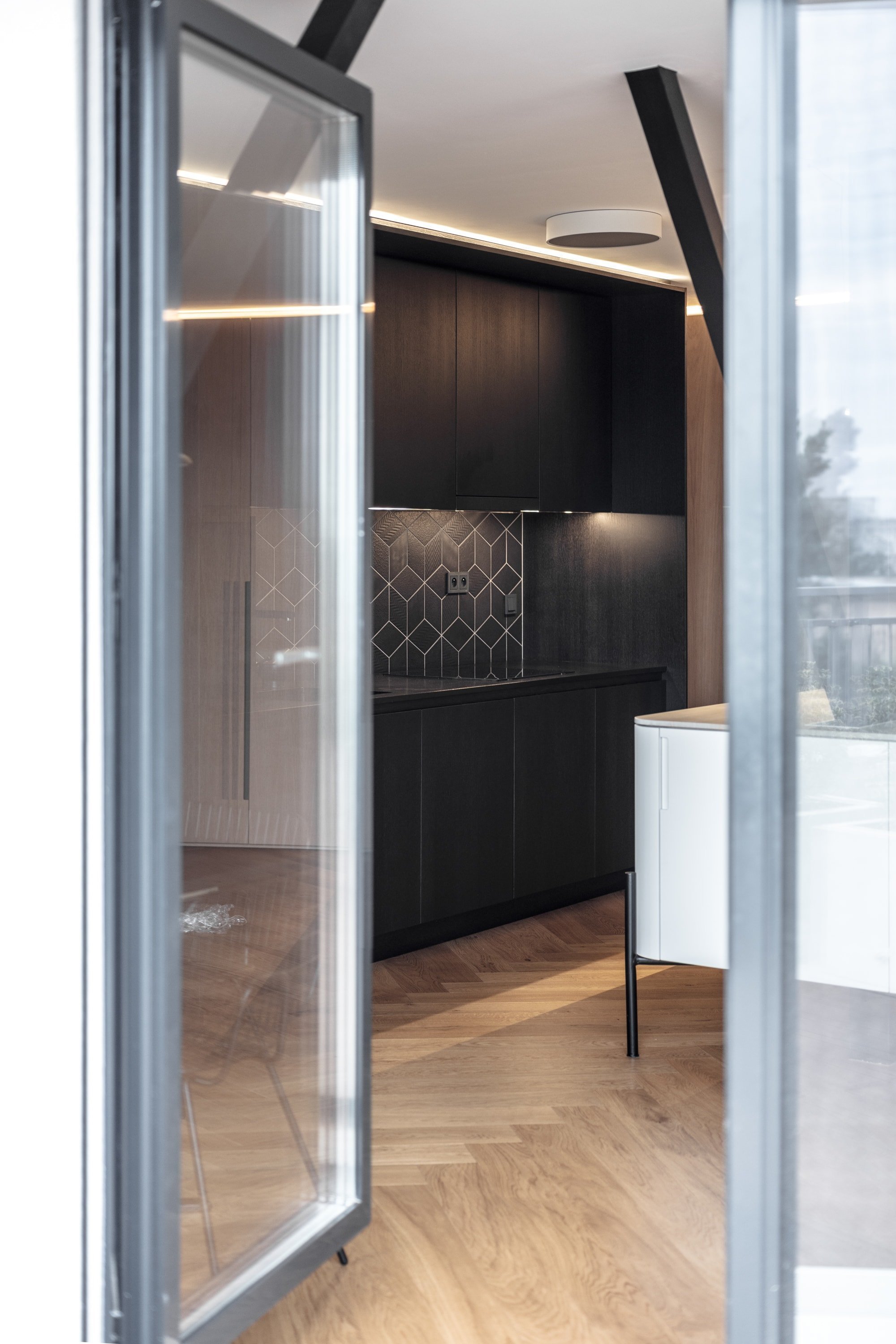 Bydlení ve střešní nástavbě panelového domu