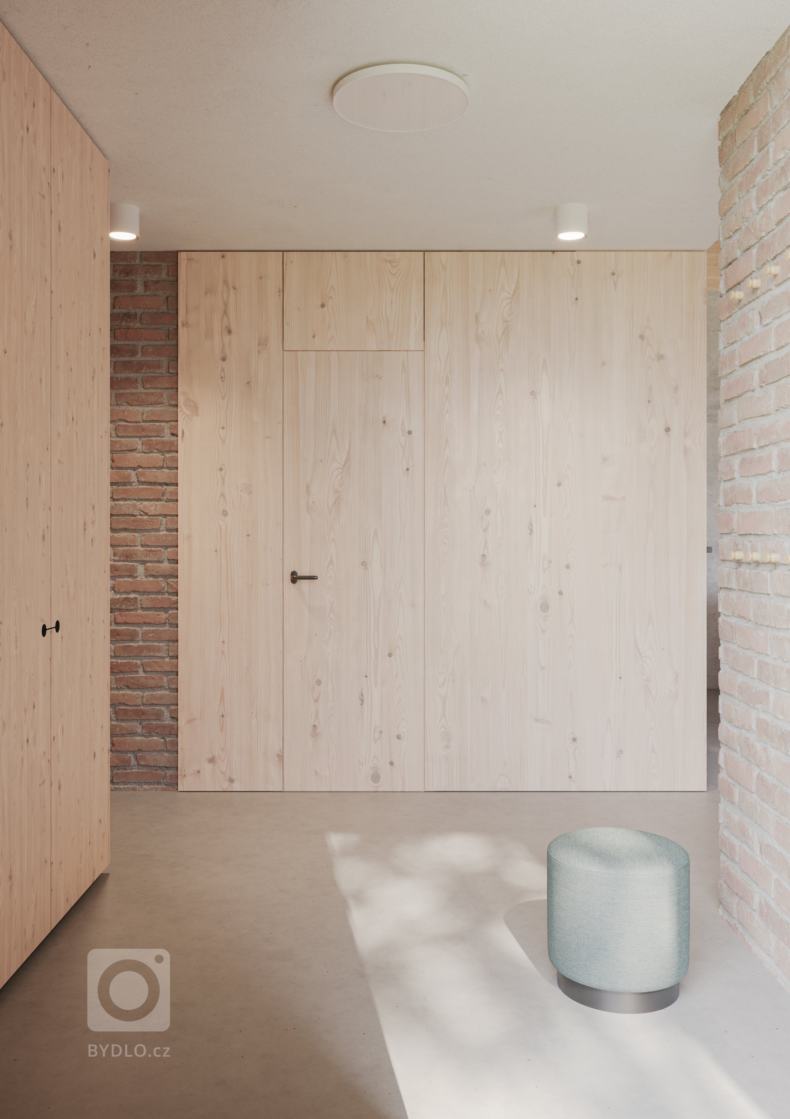 Dominantným priestorom dispozície je otvorená obývacia časť s kuchyňou a jedálňou, s výškou až po priznaný drevený krov. Okolo nej sa z oboch strán za sebou radia obytné izby a hygienické priestory. Obytné izby sú navrhované iba na prízemí. Nachádza sa tu vstupná predsieň v minimalistickom prevedení so šatníkom zo smrekovej biodosky a priznaných tehlových stien.