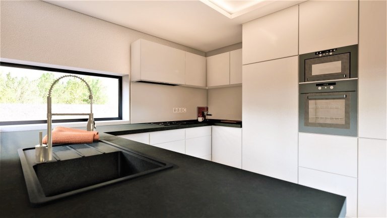 Moderní kuchyně s obývacím pokojem a krbem