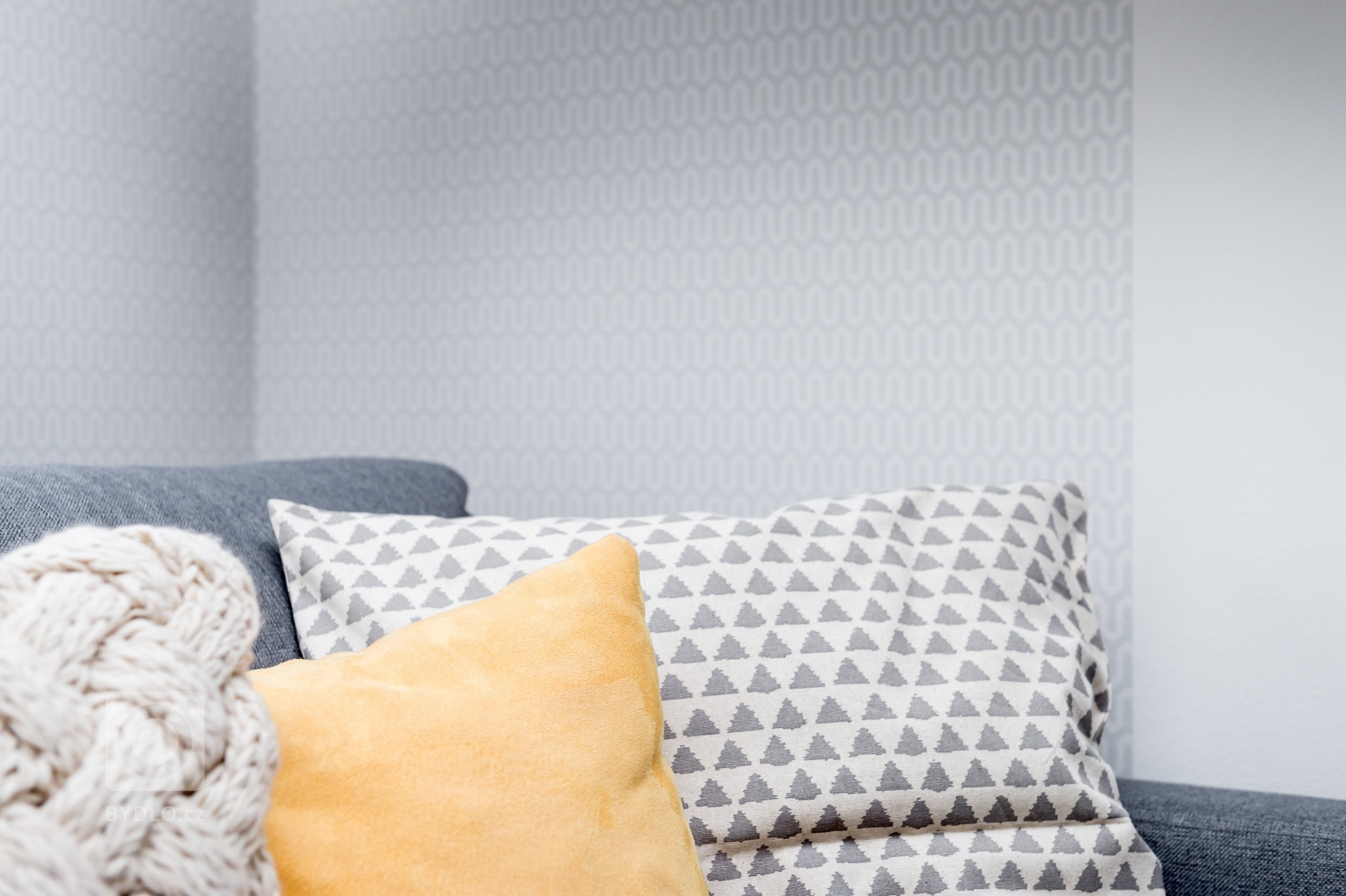 Detail textilu a tapety