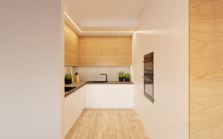 Klient za námi přišel s návrhem od kuchyňského studia, který však ignoroval fakt, že v obývacím pokoji byly dvě šachty (bílé masivní sloupy s rozvody). Našim…