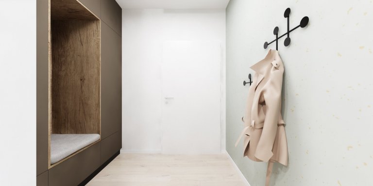 Interiér v zemitých farbách s akcentujúcou zelenou v projekte Rezidencie pri Mýte v Bratislave
