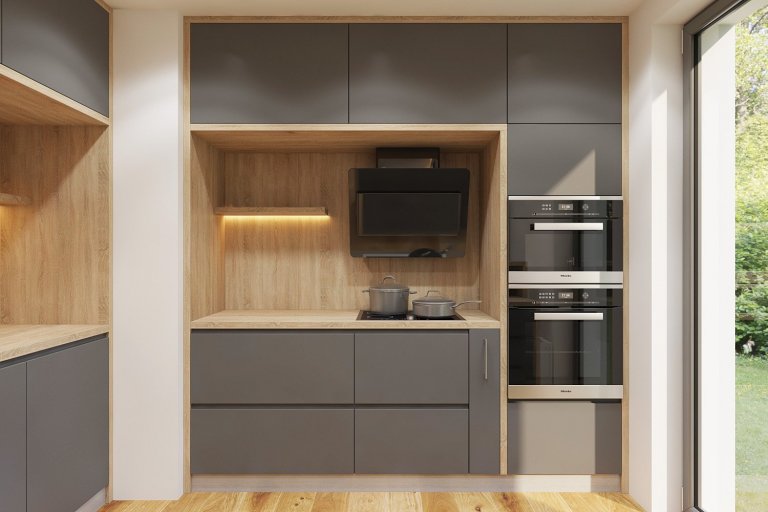 Jeden ze tří samostatných kuchyňských bloků tvoří varné centrum s vestavnými spotřebiči a designovou digestoří.