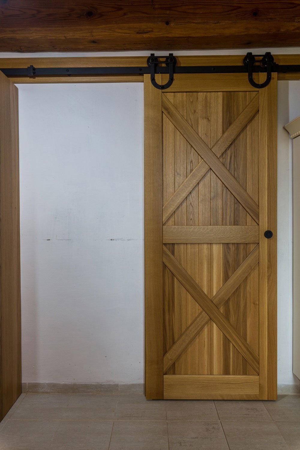 Namísto dřevostavby bydlí ve zrekonstruované sýpce