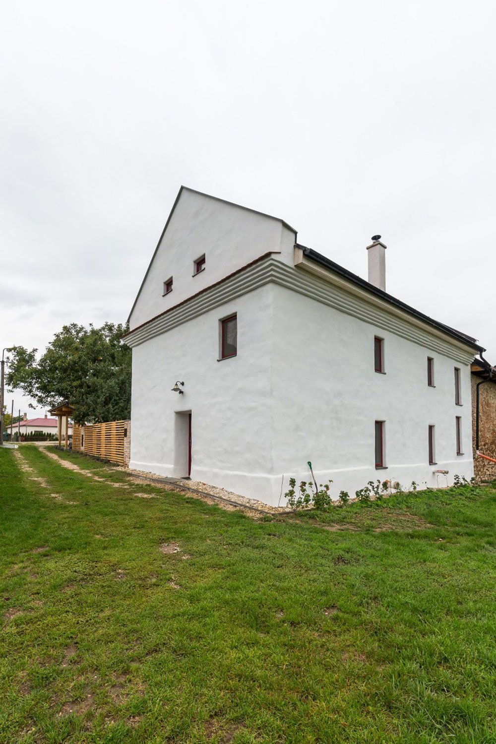 Namísto dřevostavby bydlí ve zrekonstruované sýpce