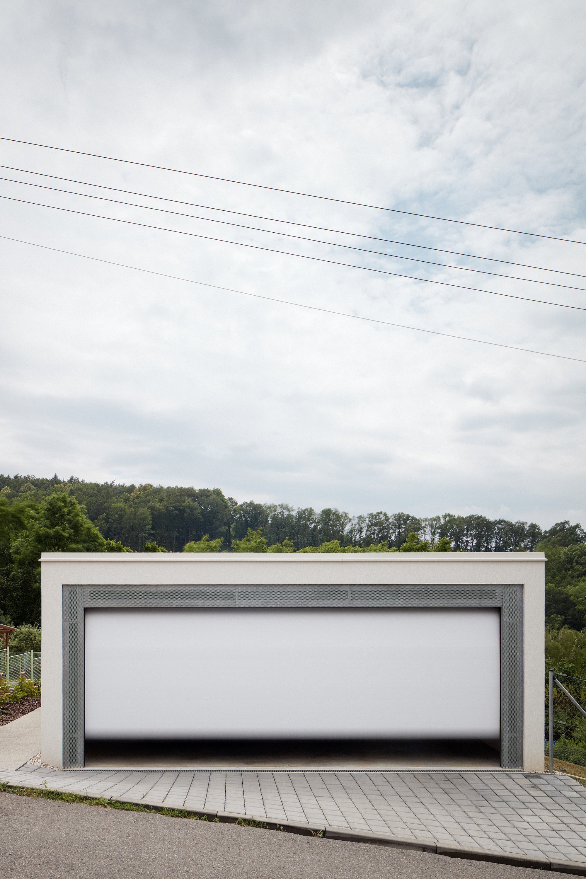 Dům ve svahu pro tři generace