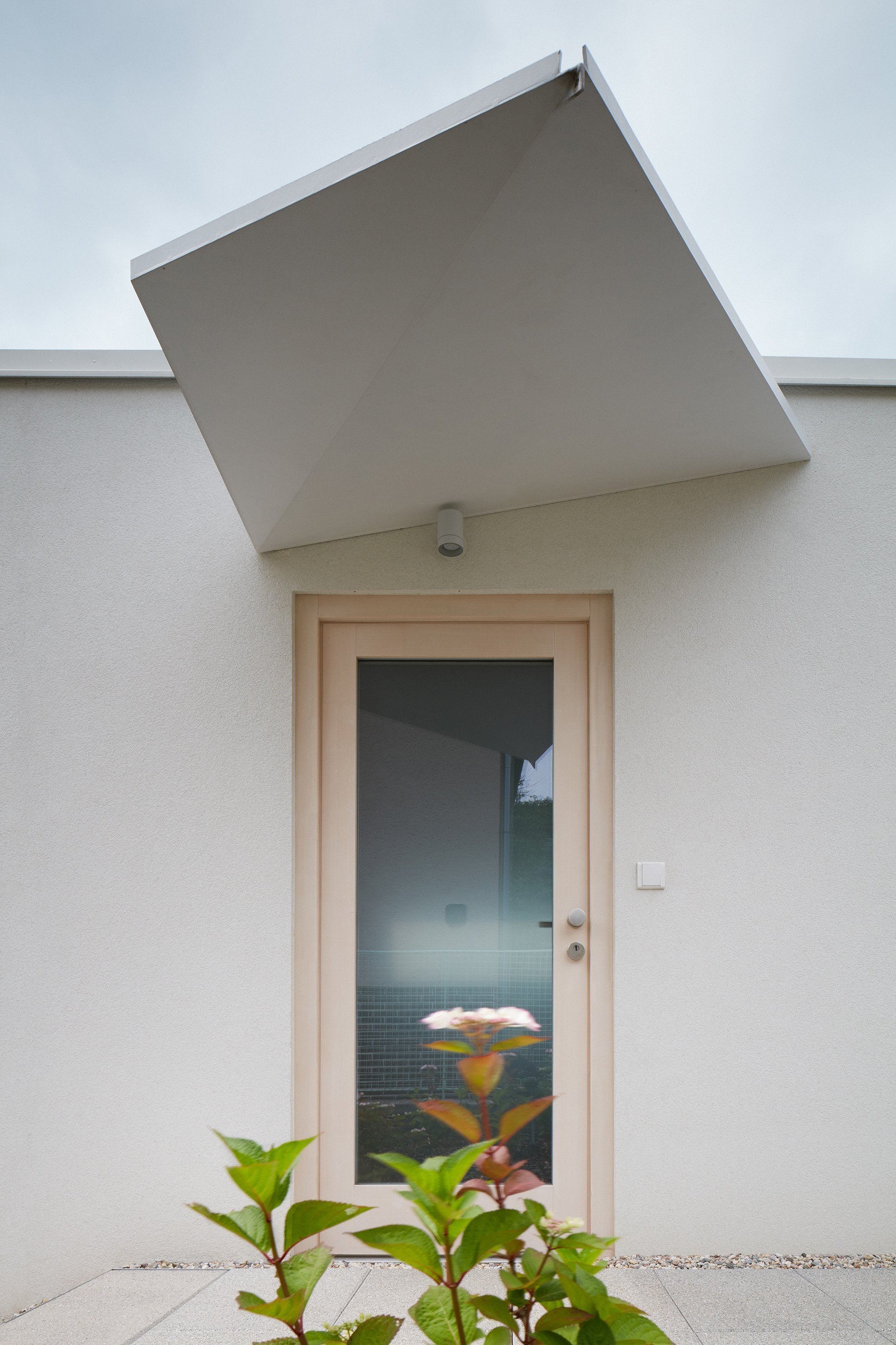 Dům ve svahu pro tři generace