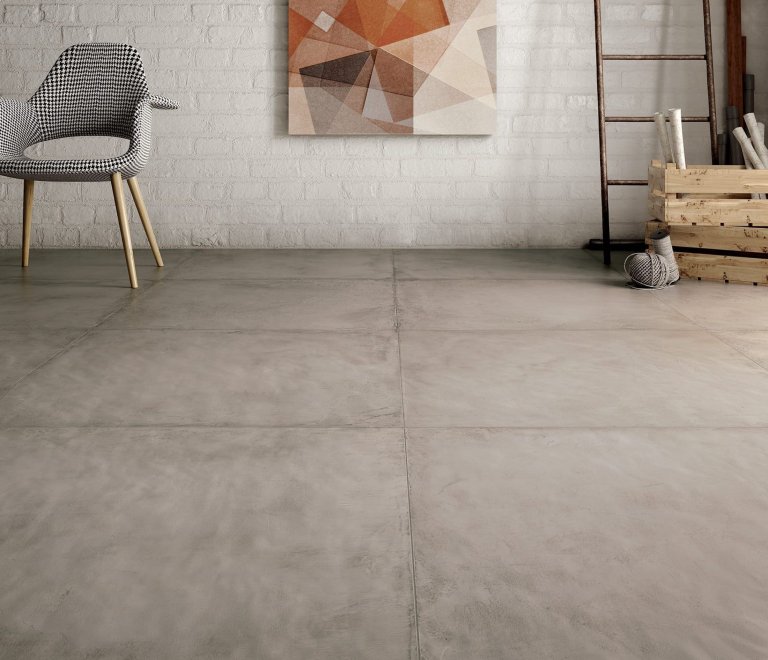 Velkoformátová dlažba na zdi pro větší přitažlivost interiéru