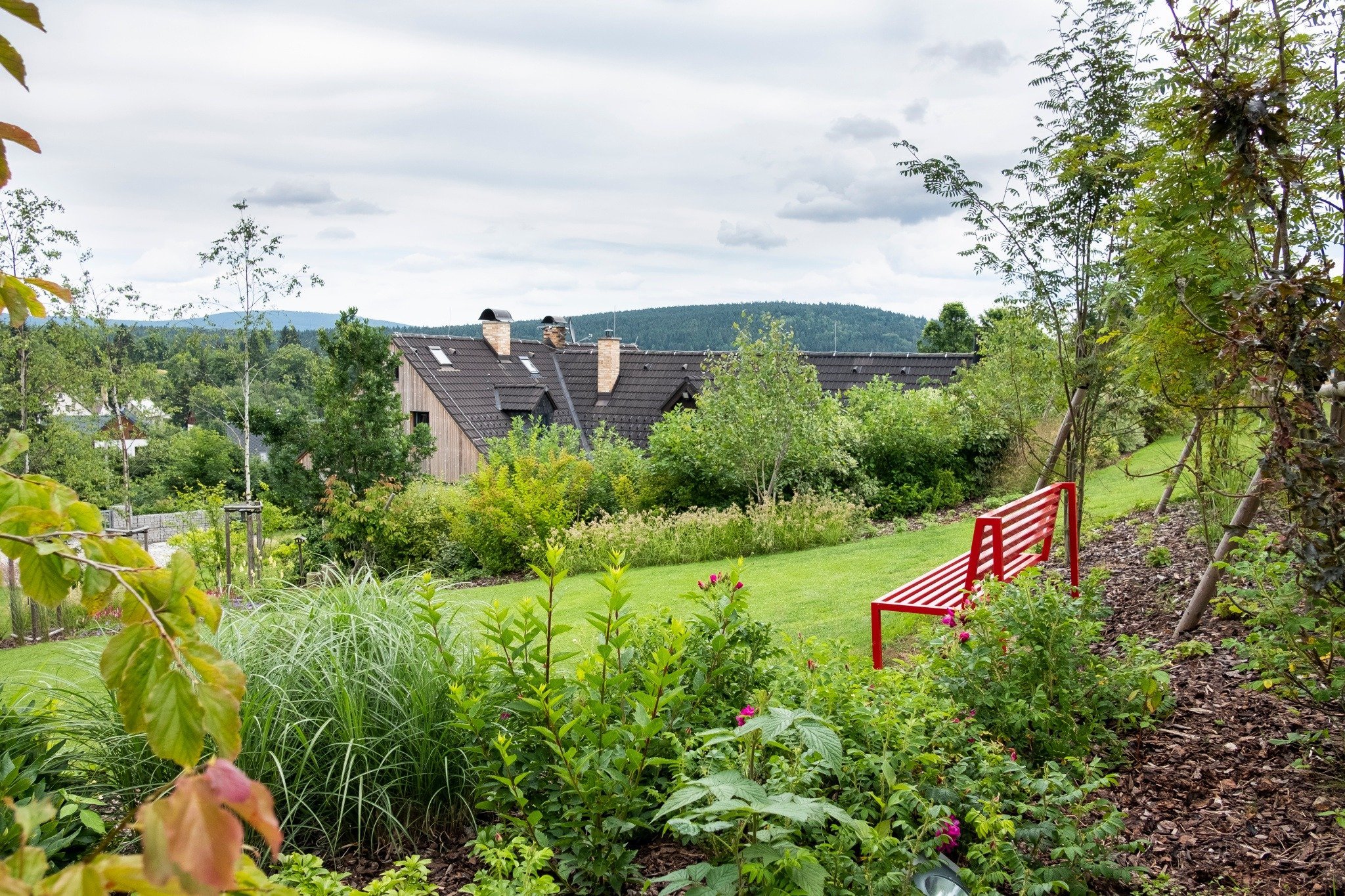 Zahrada zvolna přecházející do krajiny