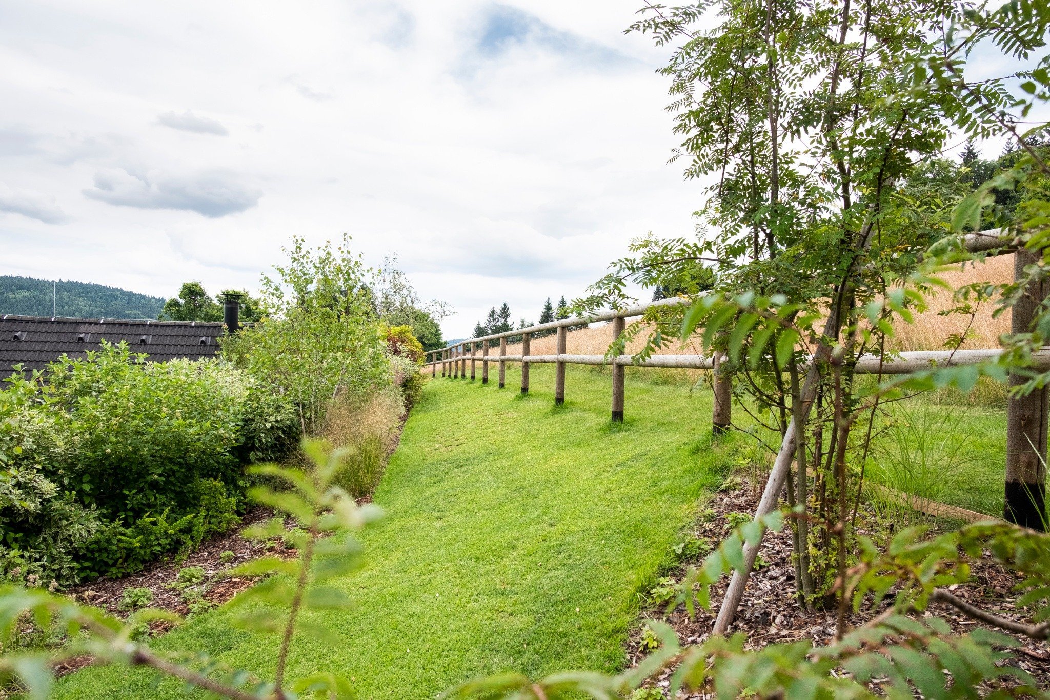 Zahrada zvolna přecházející do krajiny