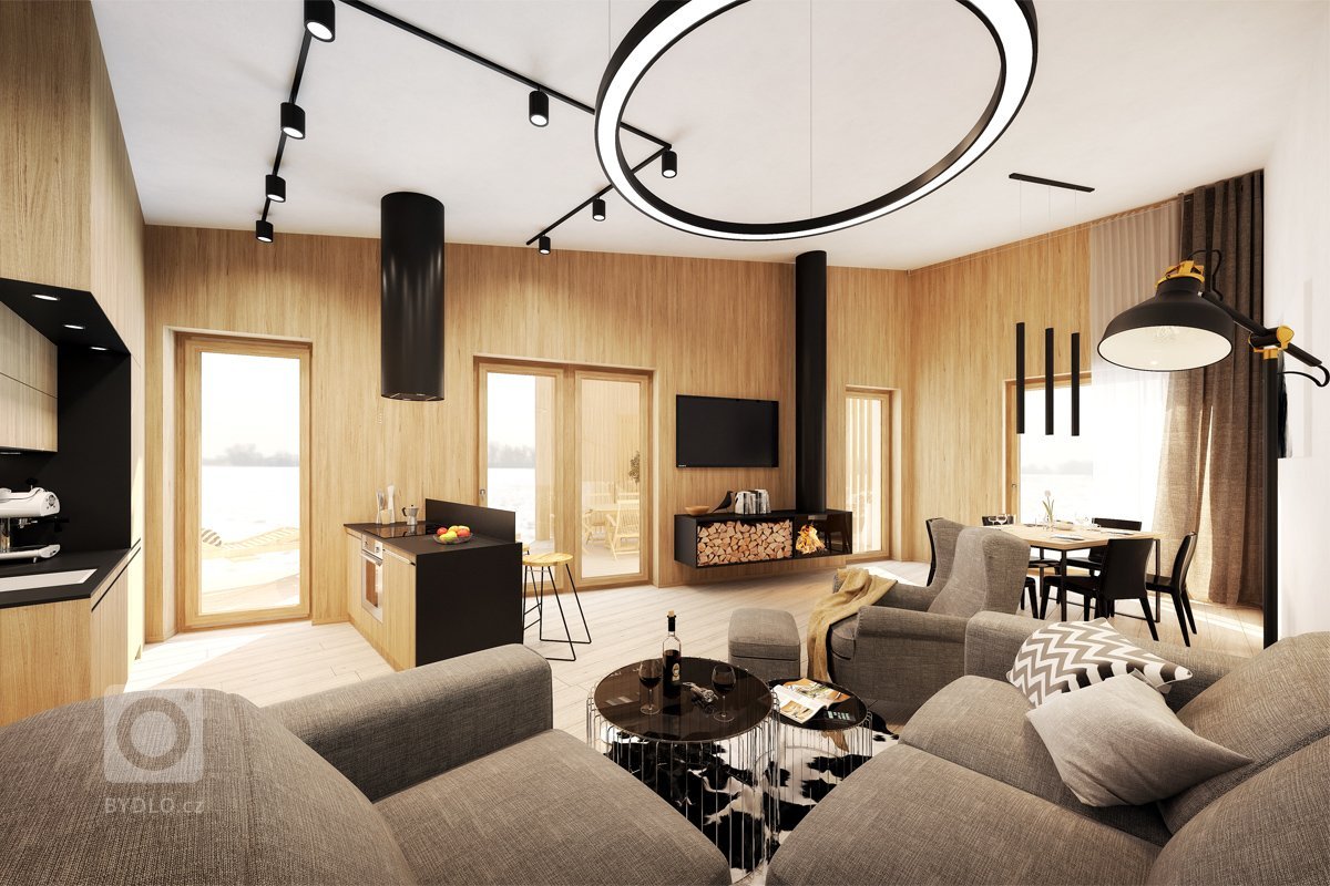 Interiér, ve kterém hraje hlavní roli dřevo, které doplňují přírodní tóny. Doplňkovým materiálem je betonová stěrka, která dodává prostoru vzhled surovosti a…