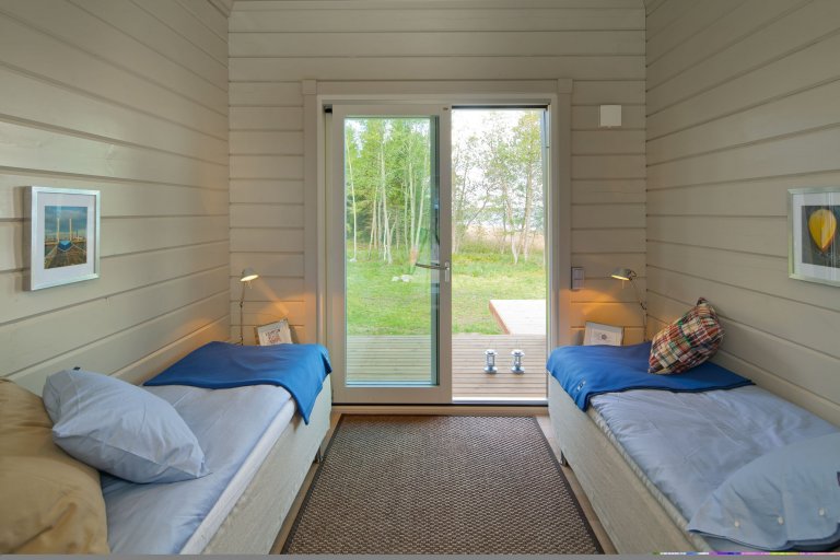 Kontio Hogsara – moderní skandinávská chata s oblou střechou