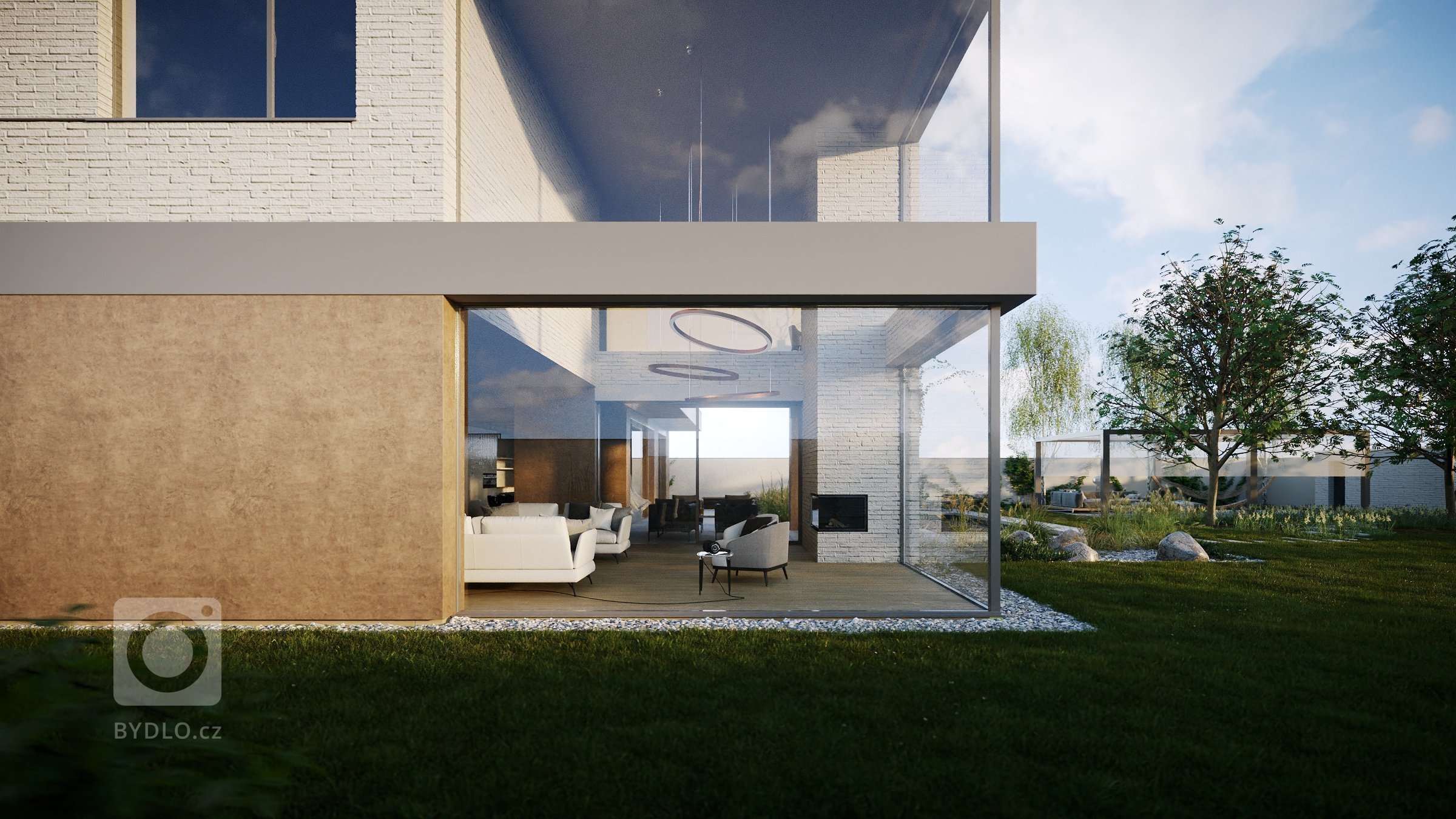 Hlavními prostory domu jsou velká kuchyně s jídelnou, která je oddělená od obývacího prostoru s krbem. Obývací pokoj je otevřen do patra a prosklen rohovým…