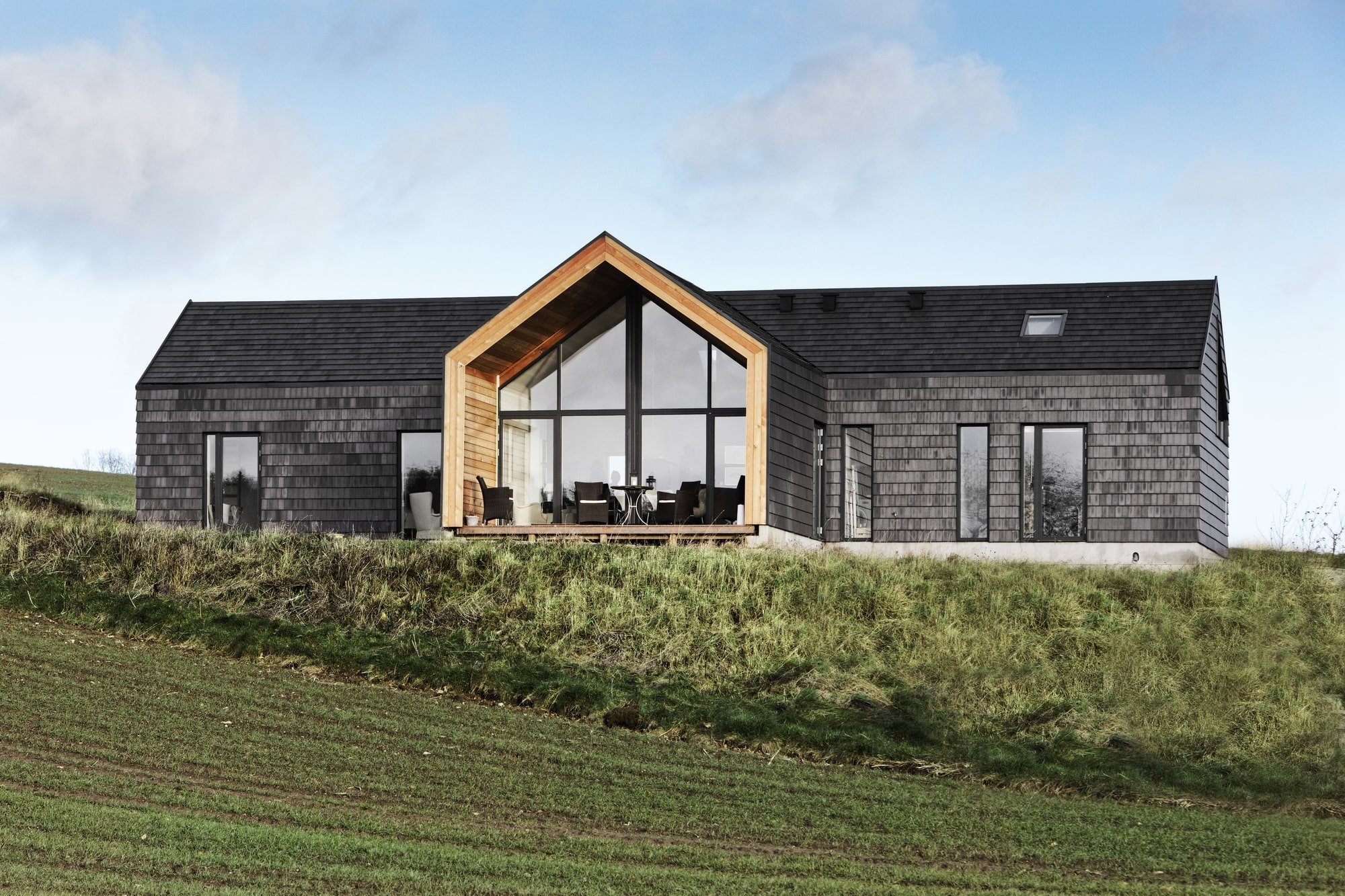 Dům s fasádou z cihlových šindelů