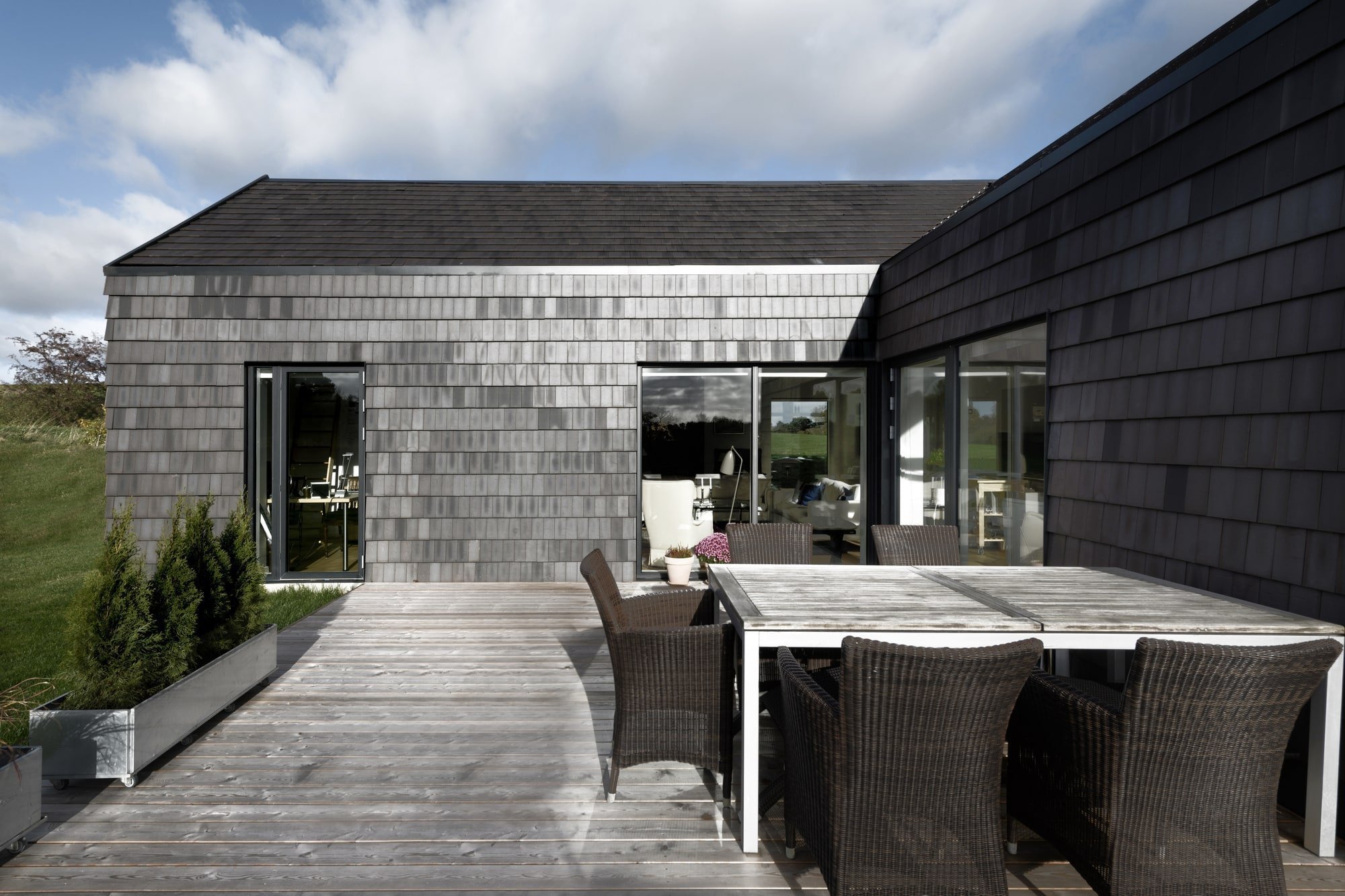 Dům s fasádou z cihlových šindelů