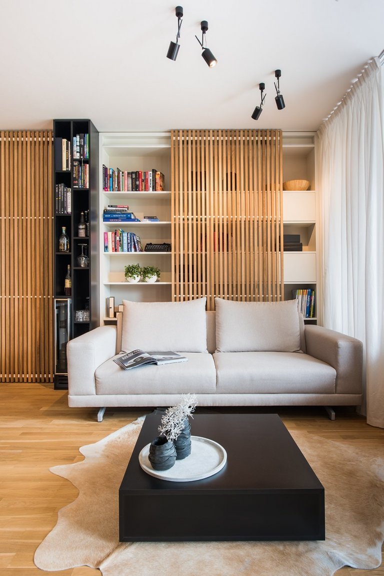 knihovan se sedací soupravou