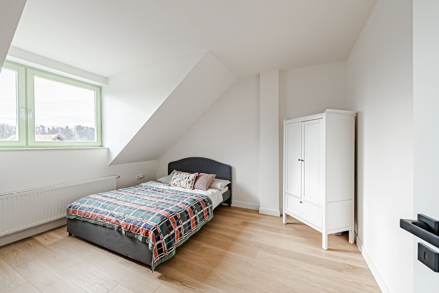 Nadčasový rodinný dům nedaleko Hostivických rybníků