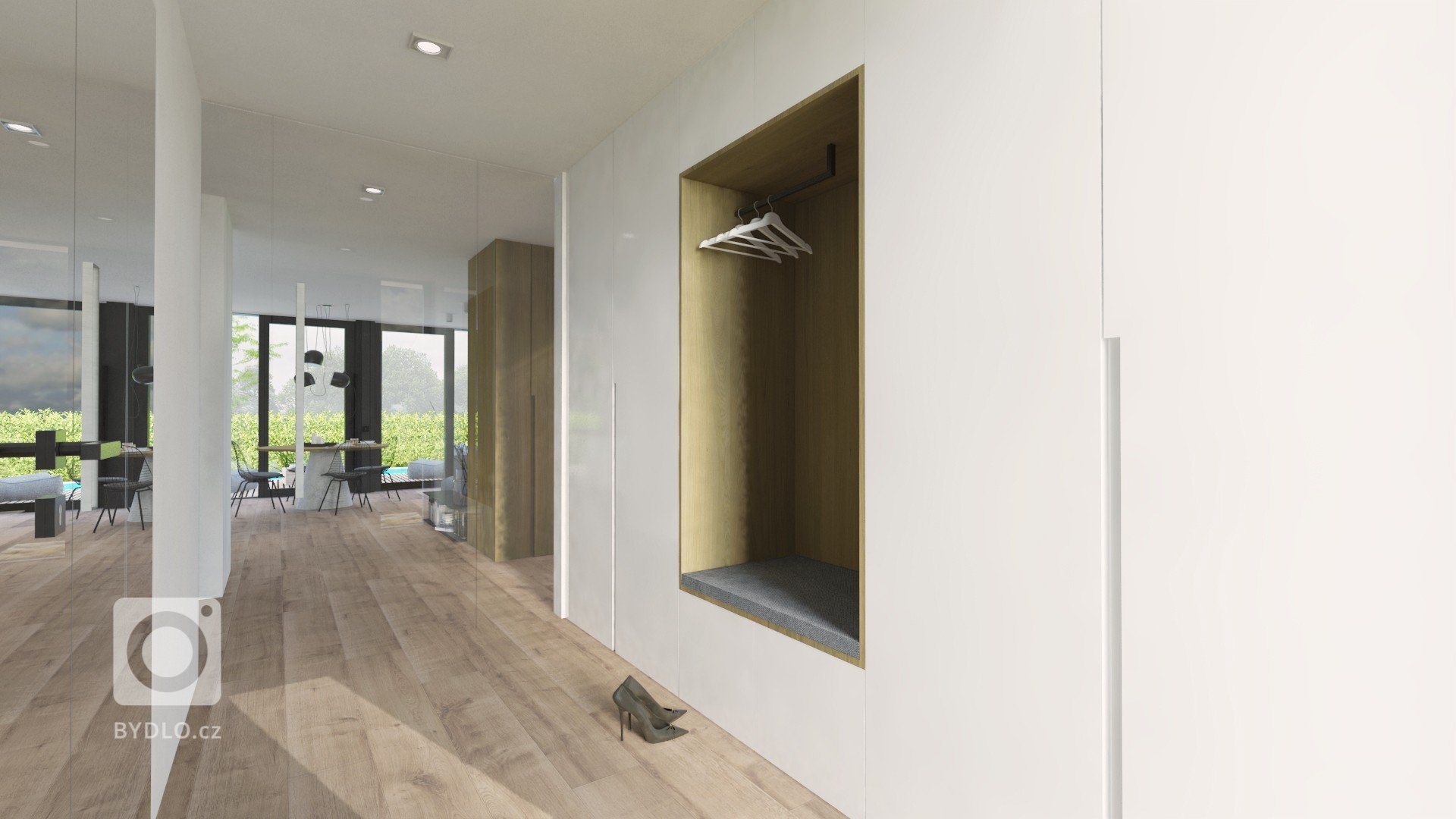 Veľkorysý priestor spoločenskej časti nám dovolil vytvoriť priestrannú kuchyňu s dizajnovým ostrovom, ktorým je čiastočne oddelená od obývacej časti. Biela na…